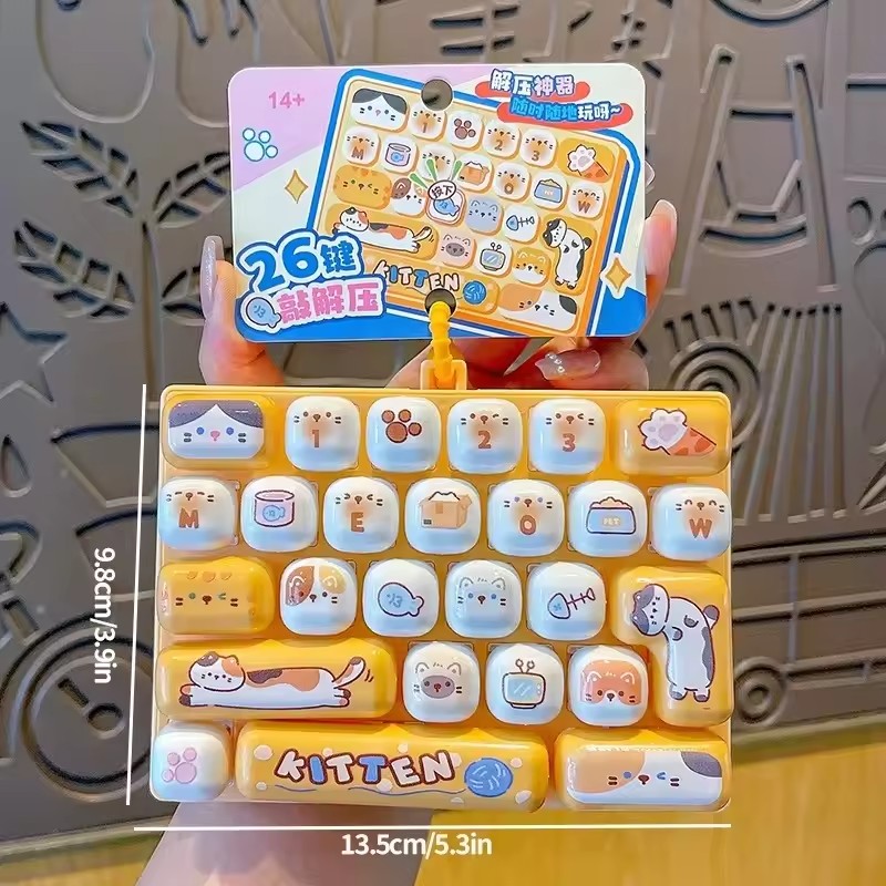 持ち運び可能なスクイッシーキーボード型ストレス解消おもちゃ。 - Japanese Snacks のレビューと価格